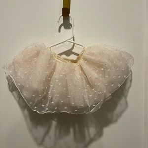 Baby girls to two. Size 0 to 12 months. off white with pika dots